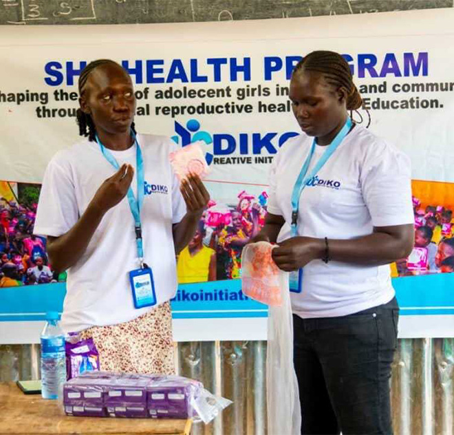 DCI volunteers with children and women in South Sudan